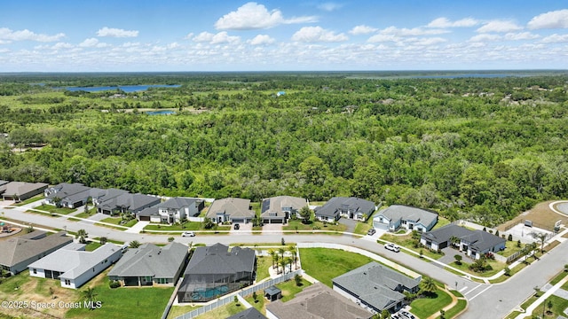 3630 Kite St, Titusville, FL 32796 - birds eye view of property with a residential view, a wooded view, and a water view