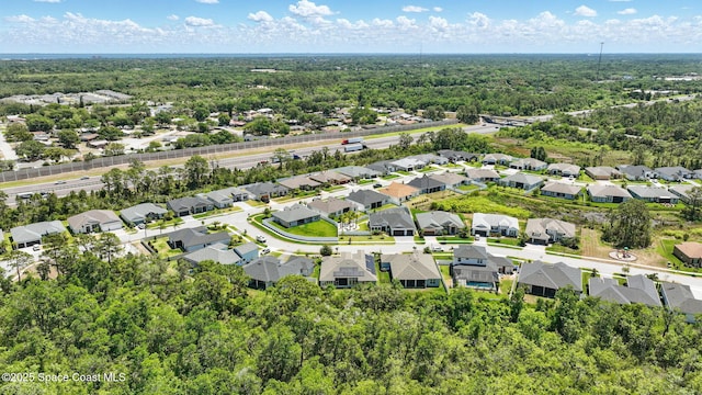 3630 Kite St, Titusville, FL 32796 - bird's eye view featuring a view of trees and a residential view