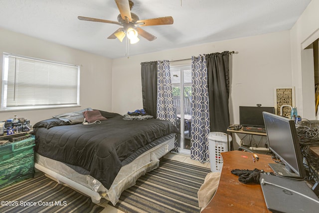bedroom featuring ceiling fan