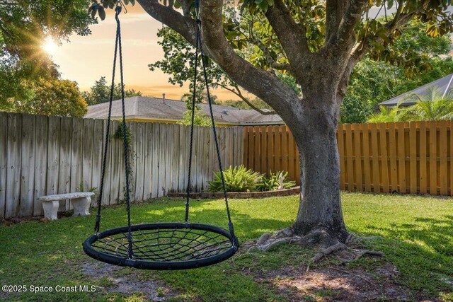 2873 Sanders Ct, Melbourne, FL 32935 - view of yard featuring a fenced backyard
