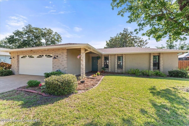 2873 Sanders Ct, Melbourne, FL 32935 - ranch-style house with driveway, fence, a garage, brick siding, and a front yard