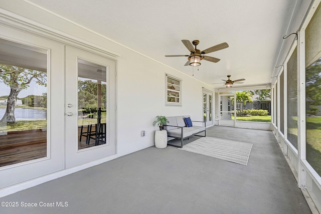 3360 Holly Springs Rd, Melbourne, FL 32934 - unfurnished sunroom featuring a ceiling fan, french doors, and plenty of natural light