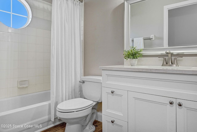 3360 Holly Springs Rd, Melbourne, FL 32934 - full bathroom featuring shower / tub combo with curtain, wood finished floors, vanity, and toilet
