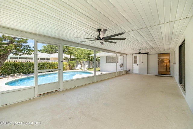 exterior space featuring a ceiling fan