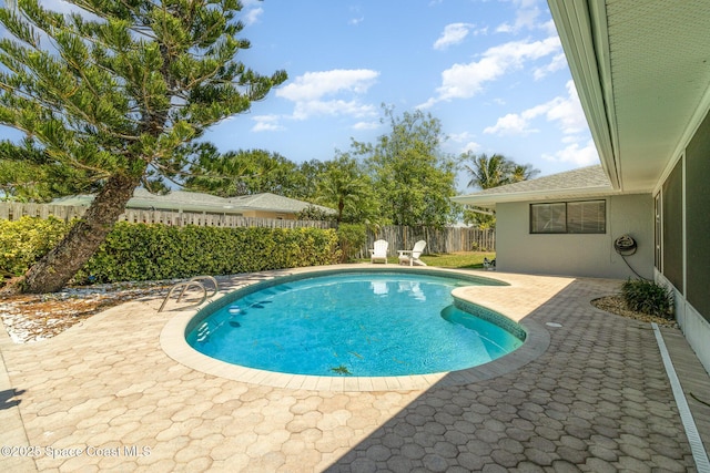 view of pool with a fenced backyard, a patio area, and a fenced in pool
