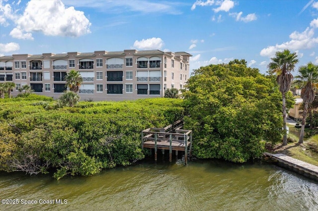 view of building exterior featuring a water view