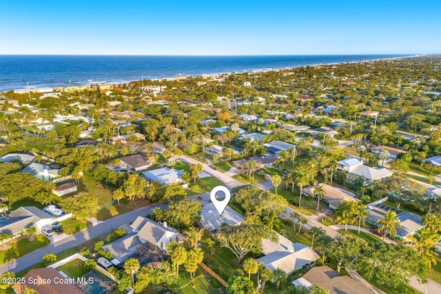 bird's eye view featuring a residential view and a water view