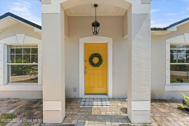 194 Saybrook Rd SW, Palm Bay, FL 32908 - property entrance featuring stucco siding