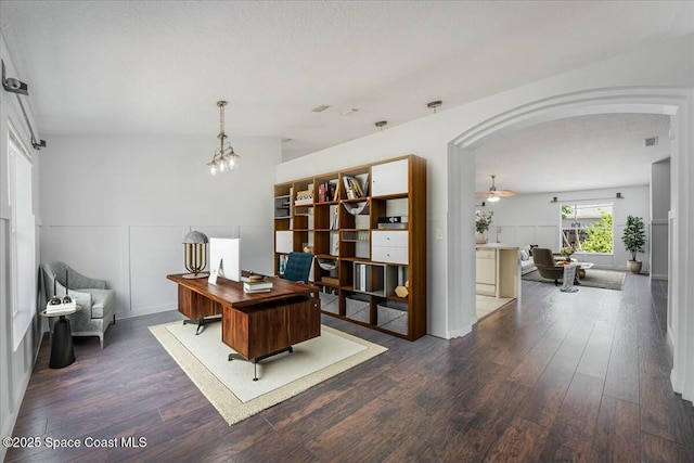 194 Saybrook Rd SW, Palm Bay, FL 32908 - office space featuring visible vents, wood finished floors, arched walkways, and ceiling fan