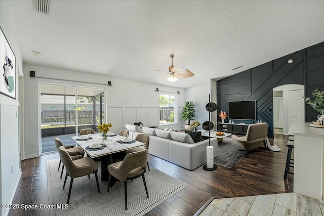 194 Saybrook Rd SW, Palm Bay, FL 32908 - dining room with hardwood / wood-style floors, visible vents, a textured ceiling, and ceiling fan