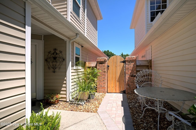 view of patio / terrace with a gate