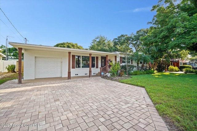 417 E Grant St, Orlando, FL 32806 - single story home with a garage and decorative driveway