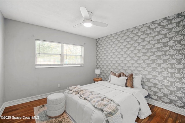 417 E Grant St, Orlando, FL 32806 - bedroom with baseboards, wood finished floors, and ceiling fan