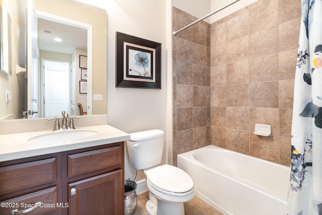 full bathroom featuring shower / bath combo, vanity, and toilet