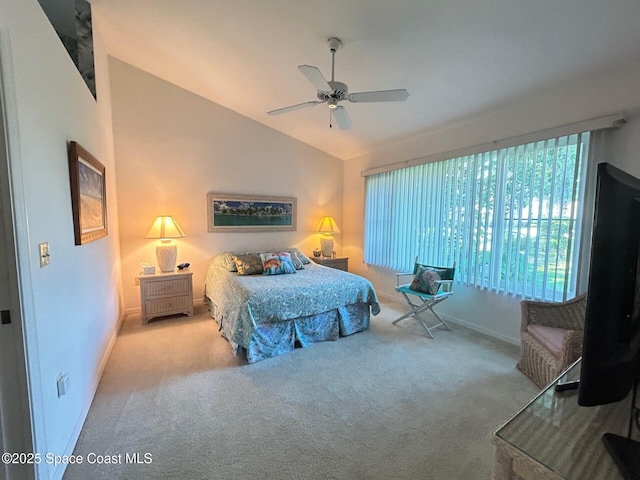 bedroom with lofted ceiling, baseboards, carpet floors, and ceiling fan