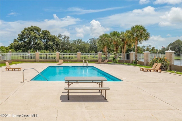 7016 Hammock Trace Dr, Melbourne, FL 32940 - community pool featuring a patio