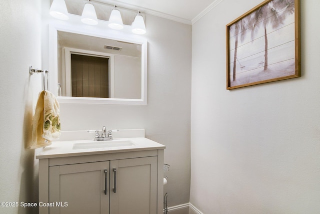 1501 Oranole Rd, Maitland, FL 32751 - bathroom with crown molding, vanity, and baseboards