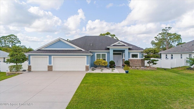 6910 Hundred Acre Dr, Cocoa, FL 32927 - view of front of home featuring a garage, a front lawn, fence, and concrete driveway