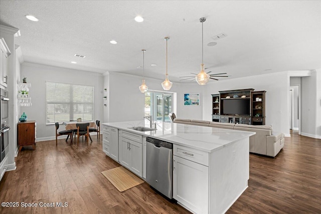 6910 Hundred Acre Dr, Cocoa, FL 32927 - kitchen with ceiling fan, decorative light fixtures, appliances with stainless steel finishes, a sink, and white cabinets