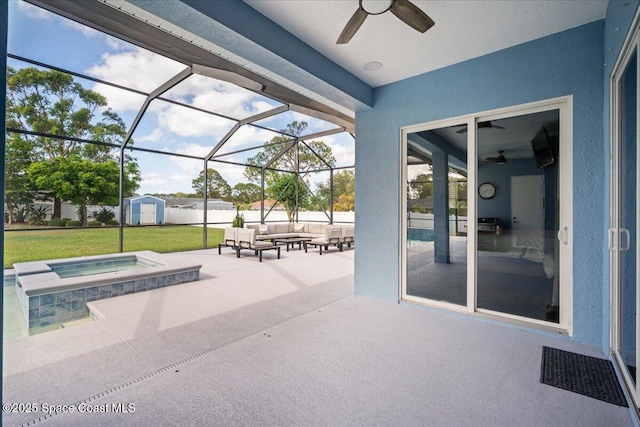 6910 Hundred Acre Dr, Cocoa, FL 32927 - view of patio / terrace with a storage shed, an outbuilding, an in ground hot tub, an outdoor living space, and a ceiling fan