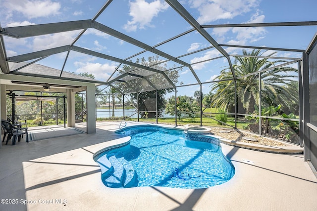 1534 Knoll Ridge Dr, Melbourne, FL 32940 - view of swimming pool with glass enclosure, a pool with connected hot tub, and a patio