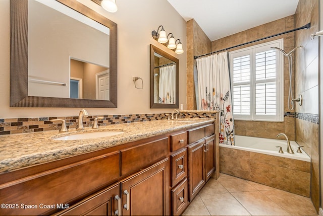 1534 Knoll Ridge Dr, Melbourne, FL 32940 - full bath with tiled shower / bath combo, double vanity, tile patterned flooring, and a sink