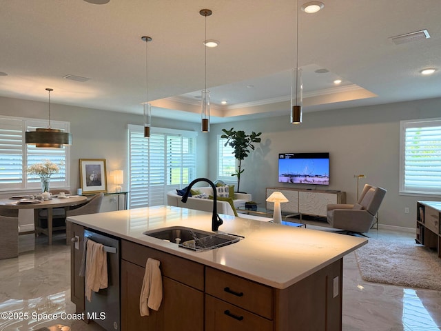 kitchen featuring open floor plan, dishwasher, marble finish floor, and a sink