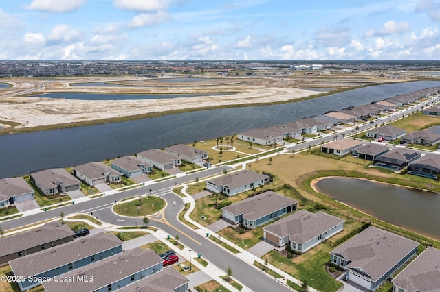 8811 Stormy Sky Ct, Melbourne, FL 32940 - aerial perspective of suburban area featuring a large body of water