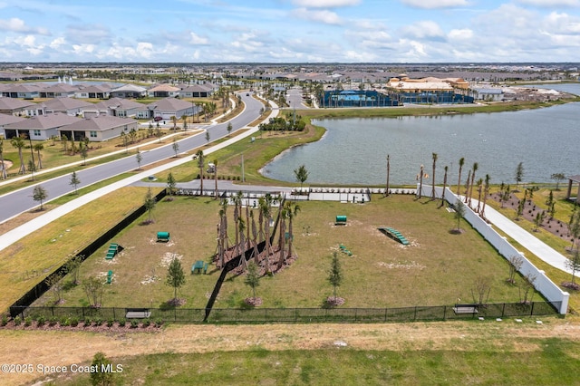8811 Stormy Sky Ct, Melbourne, FL 32940 - aerial perspective of suburban area featuring a nearby body of water