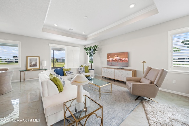 8811 Stormy Sky Ct, Melbourne, FL 32940 - living area featuring ornamental molding, a tray ceiling, marble finish flooring, baseboards, and recessed lighting