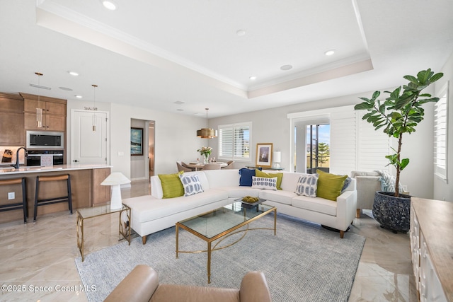 8811 Stormy Sky Ct, Melbourne, FL 32940 - living room with light marble finish floors, a raised ceiling, crown molding, and recessed lighting