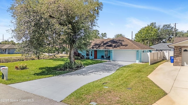 single story home featuring fence, driveway, a front yard, and a garage