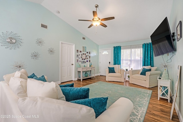 living room featuring visible vents, wood finished floors, high vaulted ceiling, and ceiling fan