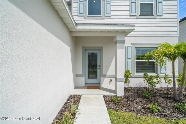 912 Covington Ct, Rockledge, FL 32955 - property entrance featuring stucco siding