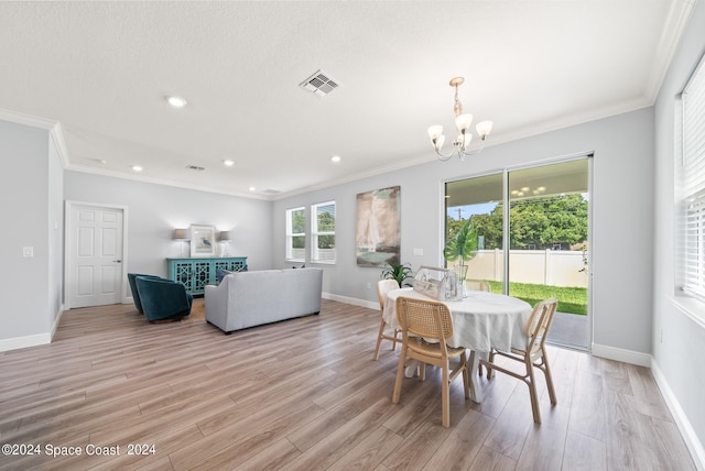912 Covington Ct, Rockledge, FL 32955 - dining area featuring visible vents, an inviting chandelier, and ornamental molding