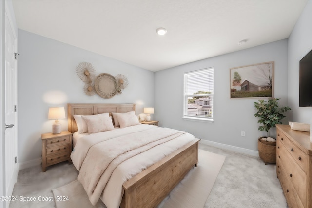 912 Covington Ct, Rockledge, FL 32955 - bedroom featuring baseboards and light colored carpet
