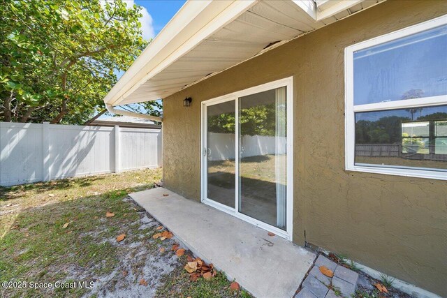 view of patio / terrace with fence