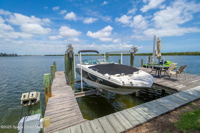 630 Paula Ave, Merritt Island, FL 32953 - dock with boat lift and a water view