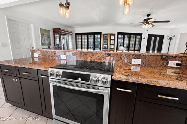 630 Paula Ave, Merritt Island, FL 32953 - kitchen featuring stainless steel electric range oven, light tile patterned floors, a ceiling fan, tasteful backsplash, and light stone counters