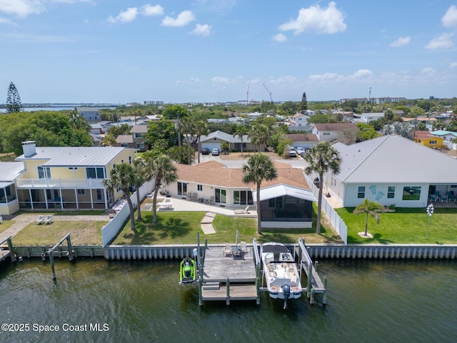 630 Paula Ave, Merritt Island, FL 32953 - aerial perspective of suburban area featuring a large body of water