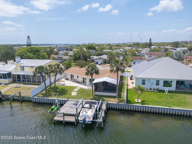 630 Paula Ave, Merritt Island, FL 32953 - aerial view of residential area featuring a nearby body of water
