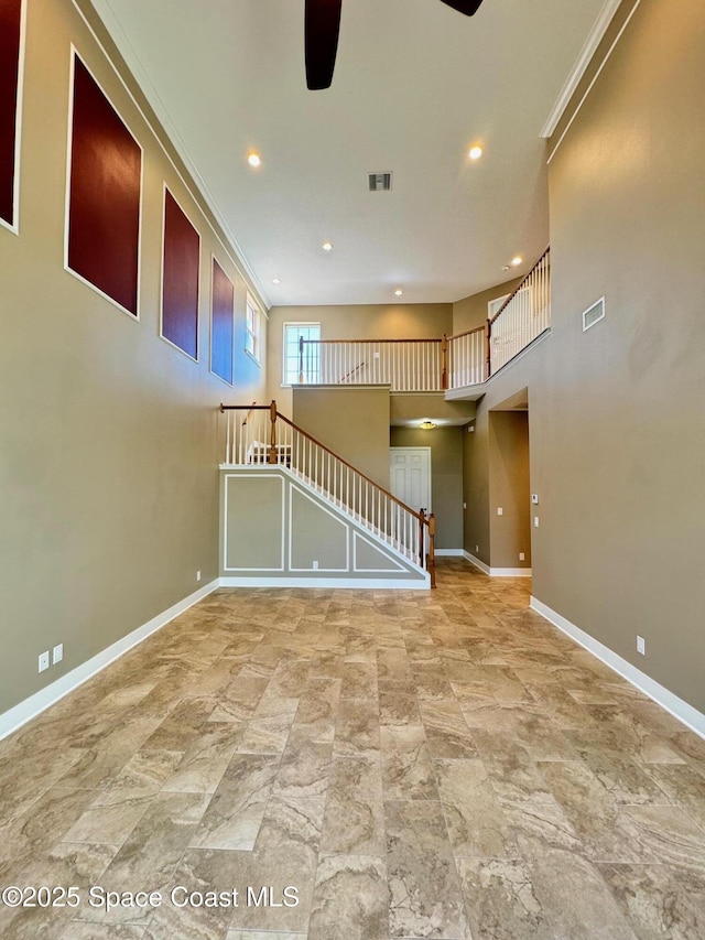 spare room with baseboards, a ceiling fan, visible vents, and recessed lighting