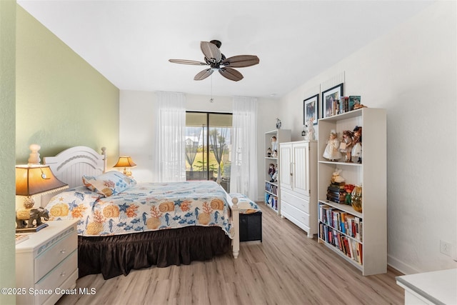 bedroom featuring baseboards, a ceiling fan, access to outside, and light wood-type flooring