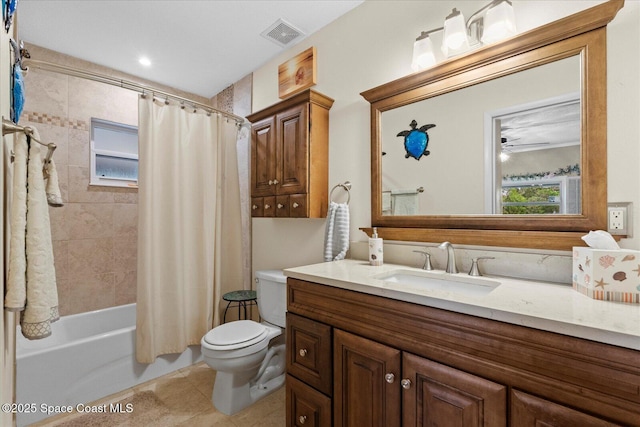 800 Hidden Oaks Ln, Oak Hill, FL 32759 - bathroom with tile patterned flooring, visible vents, toilet, vanity, and shower / tub combo