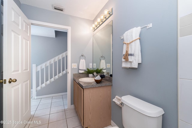 full bath with vanity, tile patterned flooring, and toilet