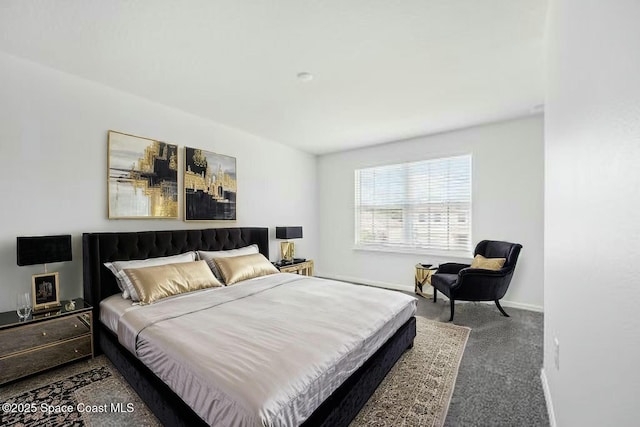 carpeted bedroom with baseboards