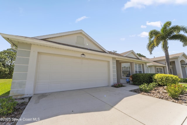 1773 Sun Gazer Dr, Rockledge, FL 32955 - ranch-style home with stucco siding, driveway, and a garage