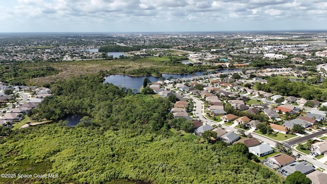 1773 Sun Gazer Dr, Rockledge, FL 32955 - drone / aerial view featuring a residential view and a water view