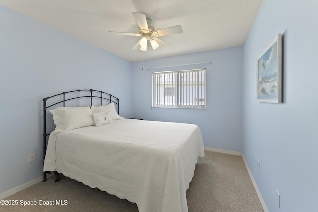 1773 Sun Gazer Dr, Rockledge, FL 32955 - bedroom with carpet, a ceiling fan, and baseboards