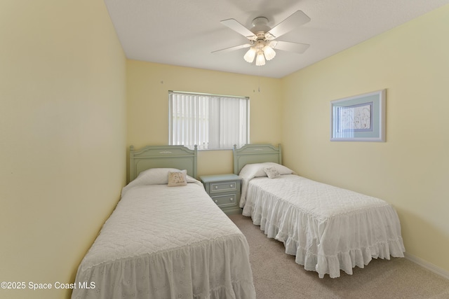 1773 Sun Gazer Dr, Rockledge, FL 32955 - carpeted bedroom with baseboards and ceiling fan